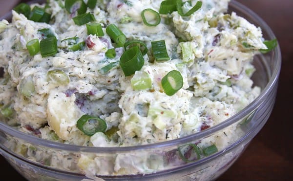 Skinny Red Potato Salad recipe is light and savory. Perfect for summer BBQ's. This is a crowd hit every time.