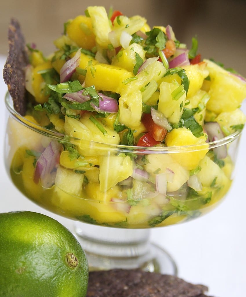 Fresh Mango Pineapple Salsa recipe has the perfect balance of sweet to spice. Tutorial of how to cut mangos and pineapple. 