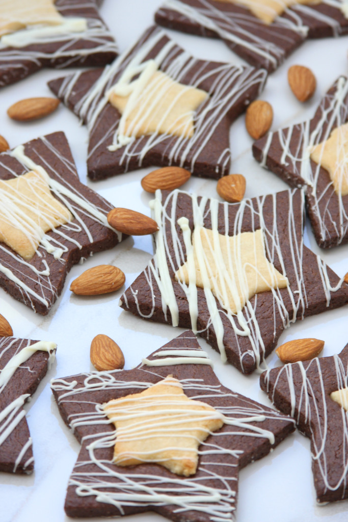 Starry Night Marzipan Cookies recipe 1 is a chocolate almond sugar cookie with a delectable marzipan filling & white chocolate drizzled. This will be a show stopper!!