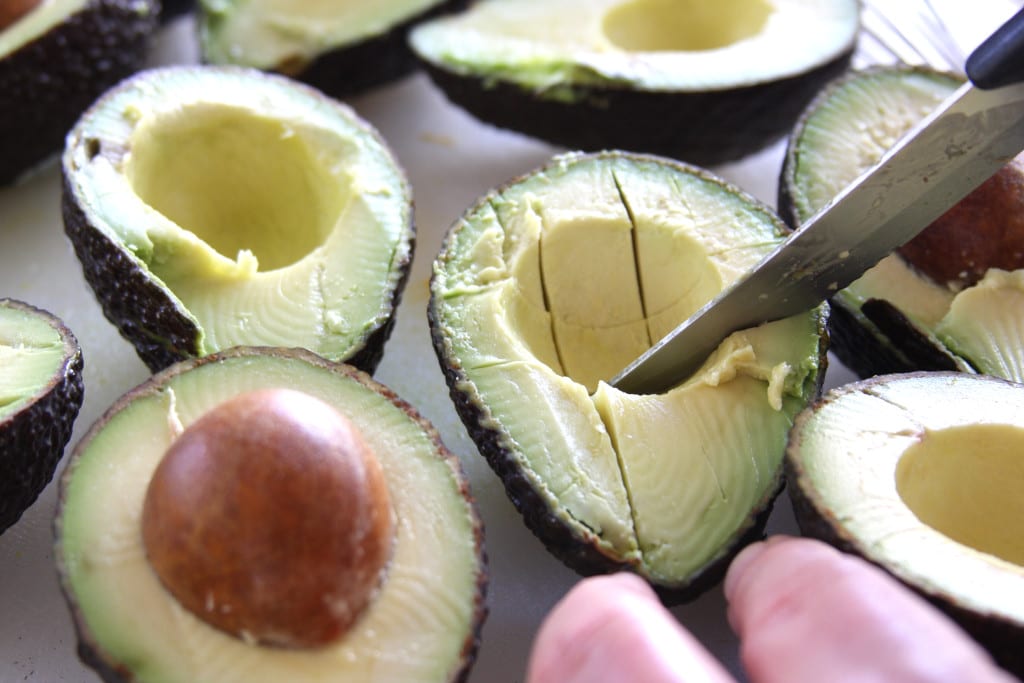 Cutting Avocados for Simple Healthy Guacamole.