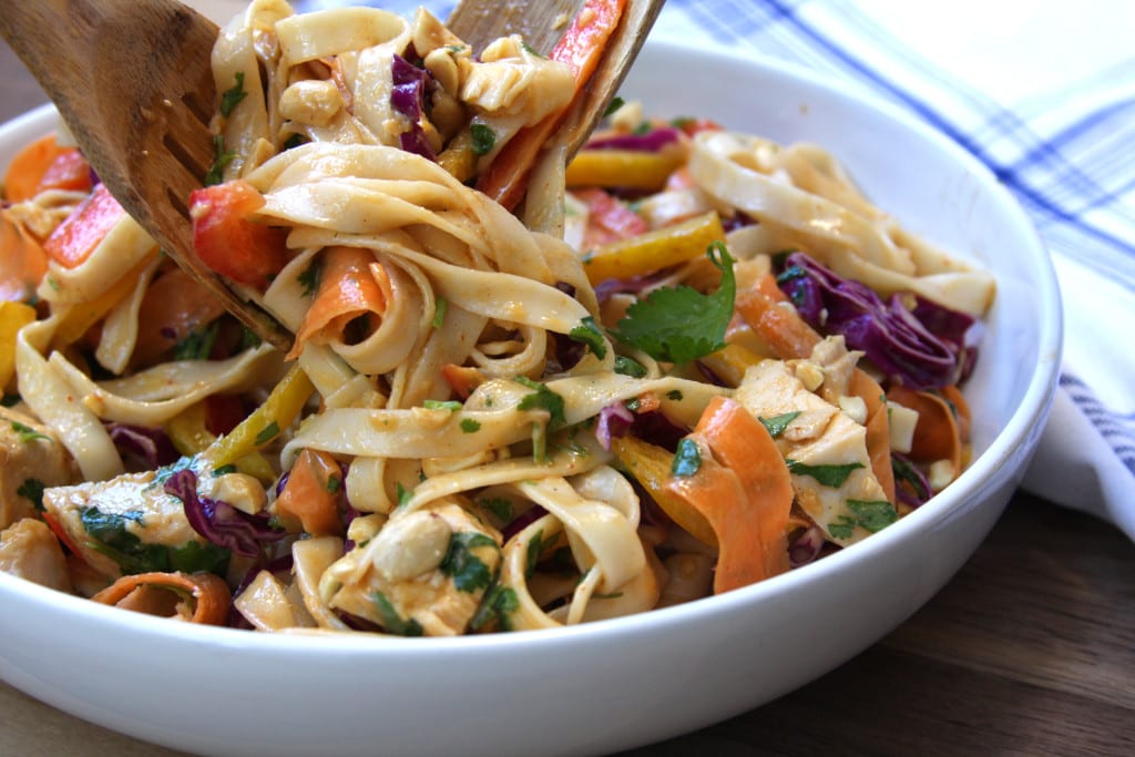 Chicken Peanut Udon Noodle Salad recipe is a cold pasta salad with flavors of sesame oil, peanut butter, sriracha and lime. Such a fun way to eat veggies in the colors of the rainbow. My husband was drooling over this dish.