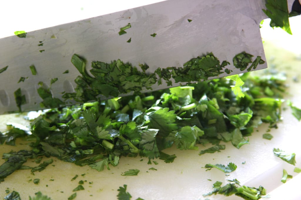 Finely chopping parsley for Chimichurri Sauce.