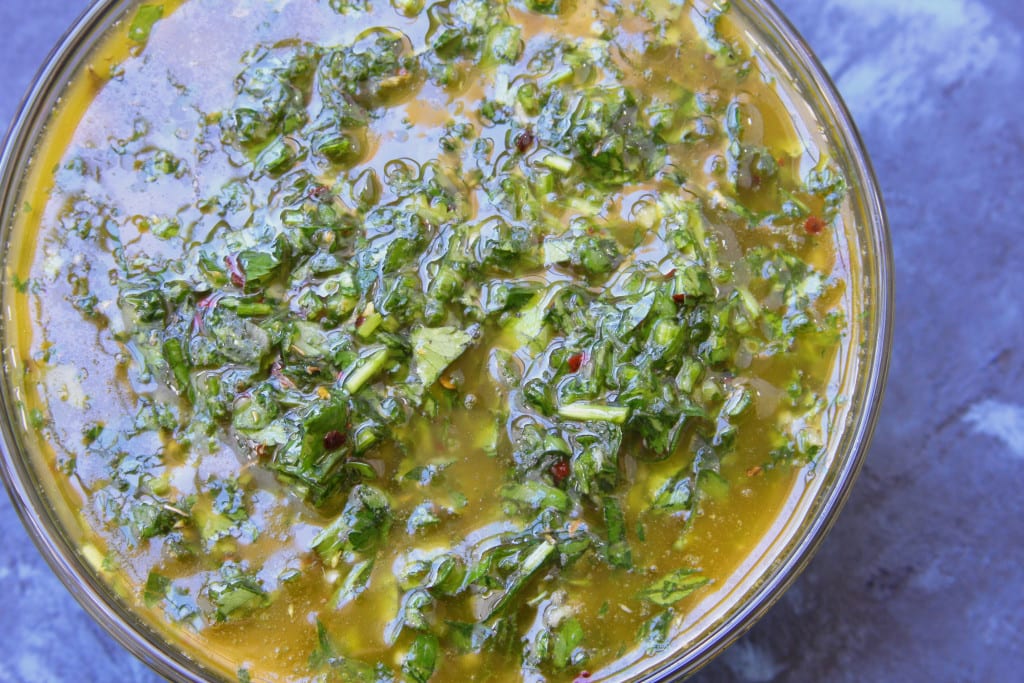 Chimichurri Sauce recipe- fresh flavors of parsley, cilantro, oregano and lemon. Adds life to veggies and is the perfect companion to steak.