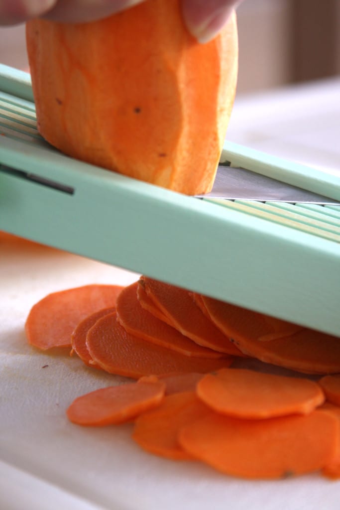 Using a mandolin creates even pieces perfect for the Homemade Sweet Potato Chips