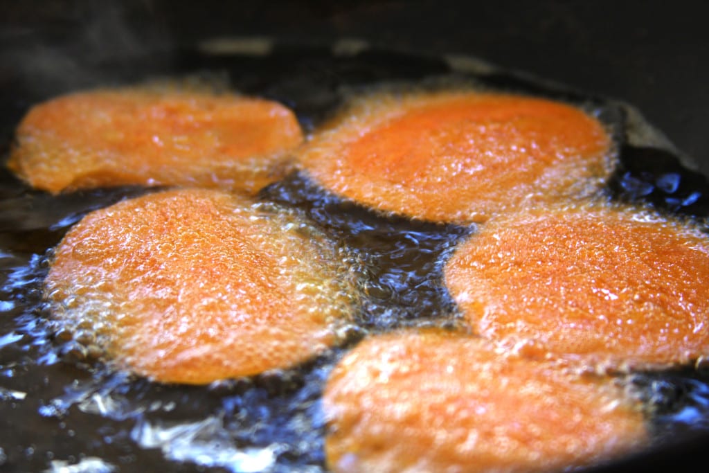 Frying the Homemade Sweet Potato Chips in coconut oil.