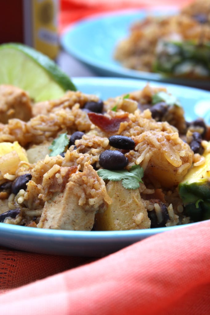 Caribbean Chicken & Rice recipe has bacon, pineapple, black beans and Caribbean spices. The wonderful aromas of will bring your family to the kitchen.