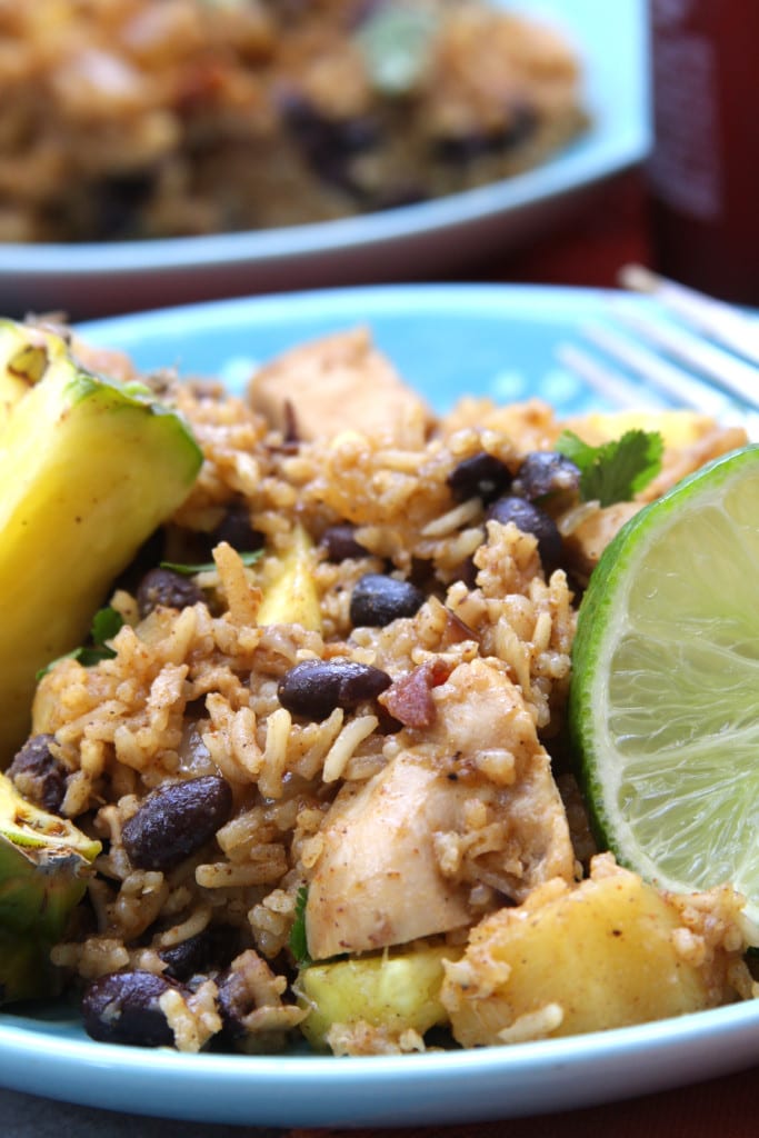 Caribbean Chicken & Rice recipe has the sweetness of pineapple , savory bacon and the spices of the Caribbean. Incredibly easy to make and perfect for any time of the year.