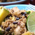 Caribbean Chicken & Rice recipe has the sweetness of pineapple , savory bacon and the spices of the Caribbean. Incredibly easy to make and perfect for any time of the year.