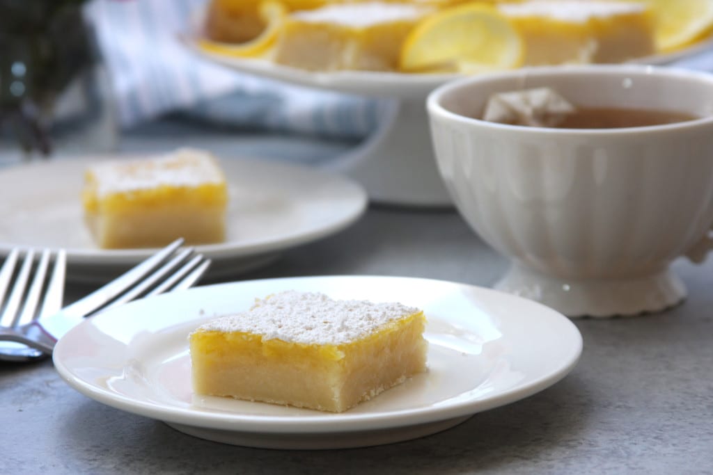 Lusciously Lemon Bars recipe is the perfect mouth-watering treat for lemon lovers. Gluten free option included.