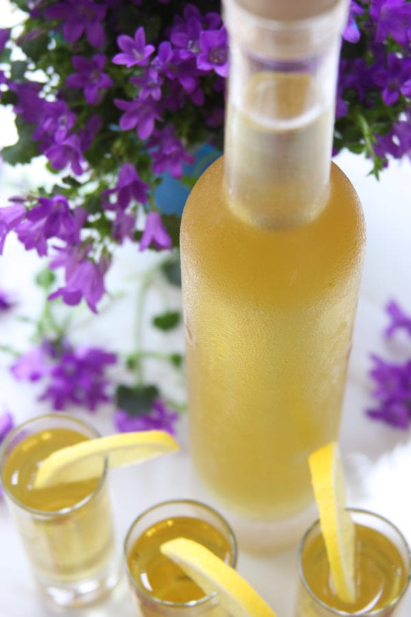Homemade Limoncello in a frosted bottle.