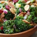 Super Healthy Broccoli Salad recipe is a twist on a classic with yogurt, pipits , chia and hemp seeds. Everyone gobbles this salad up and loves the crunch.