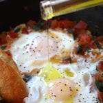 Italian Tomato and Eggs recipe has freshly sautéed tomatoes, fragrant basil and eggs cooked to your preference. Add in truffle oil or truffle salt and you will have a meal made in heaven.