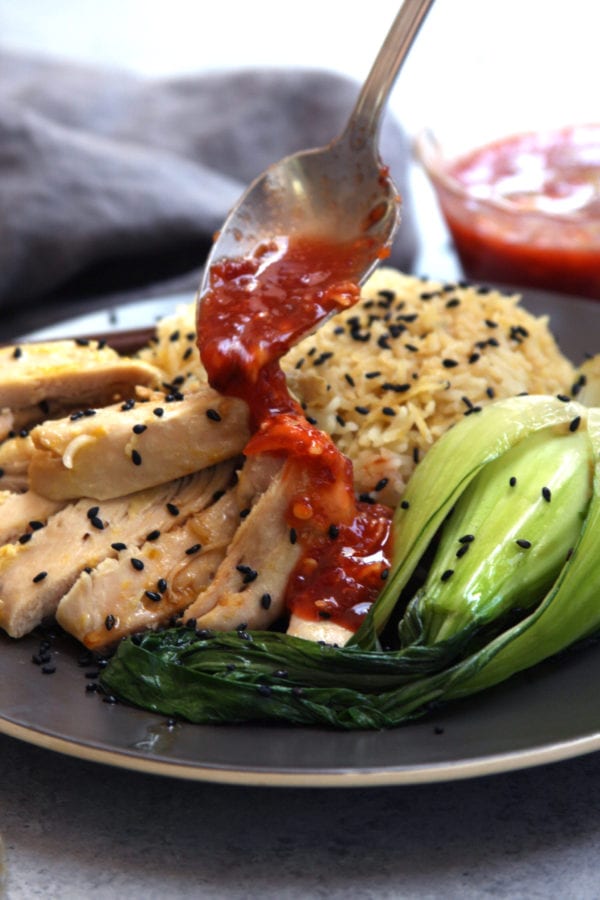 One-Pot Asian Chicken and Rice is a fast, easy and incredibly delicious recipe with flavors of ginger, sesame and garlic. A perfect 30 min meal for busy week nights.