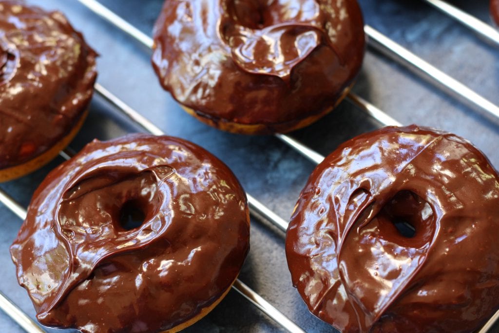 Spiced Pumpkin Donuts recipe is packed with the flavors of Fall and has extra nutrition snuck in all covered in cinnamon spiked ganache. A treat that will put a smile on everyone's face.