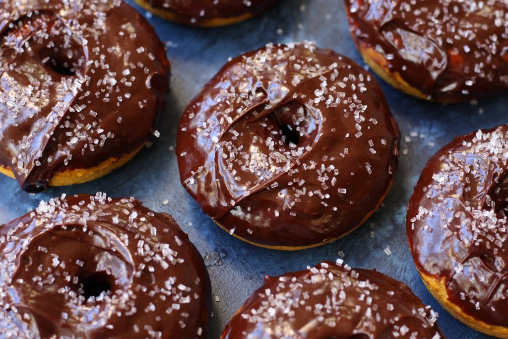 Spiced Pumpkin Donuts recipe is packed with the flavors of Fall and has extra nutrition snuck in all covered in cinnamon spiked ganache. A treat that will put a smile on everyone's face.