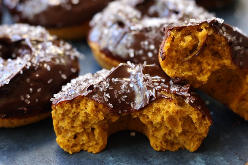 Spiced Pumpkin Donuts recipe is packed with the flavors of Fall and has extra nutrition snuck in all covered in cinnamon spiked ganache. A treat that will put a smile on everyone's face.