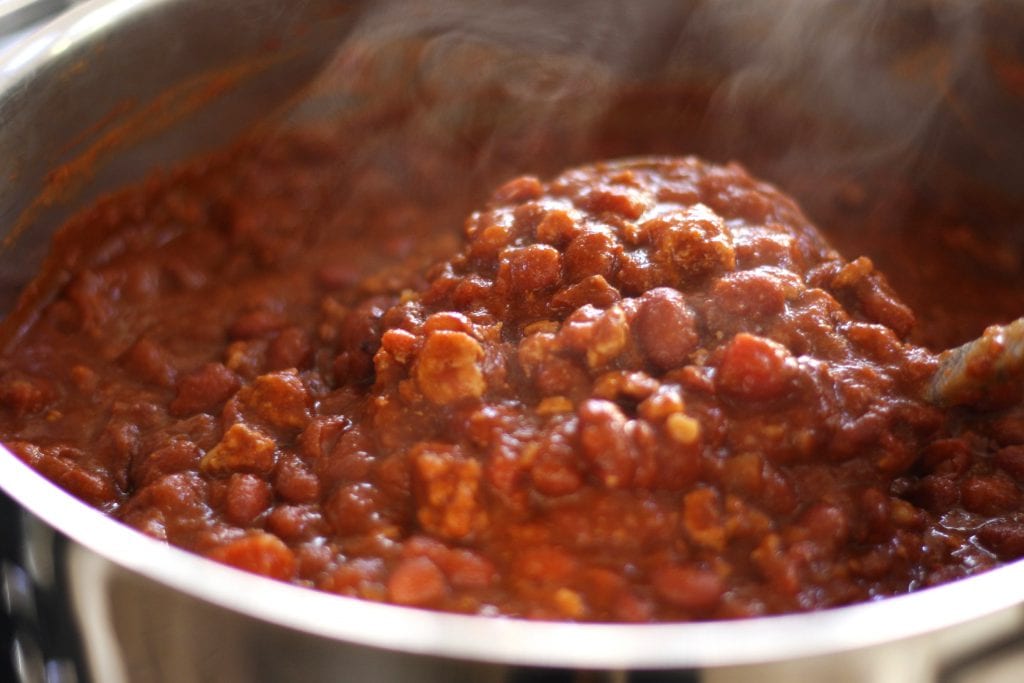 Tortilla and Beans is a family recipe dating back over 70 years. A crispy corn tortilla is topped with a hearty chili, simple coleslaw and black olives. Delicious, satisfying and budget friendly, this is a meal my husband can't get enough of.