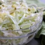 Simple Coleslaw is an easy and delicious side dish that comes together in minutes. Low-carb and gluten free, it's the perfect companion to many a dish.