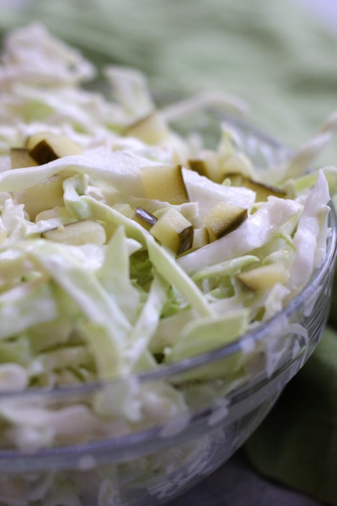 Simple Coleslaw is an easy and delicious side dish that comes together in minutes. Low-carb and gluten free, it's the perfect companion to many a dish.