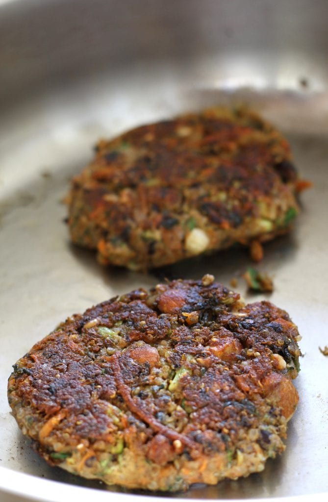 Black Bean Veggie Burgers recipe is completely Vegan and incredibly satisfying that even meat eaters love these. Made with quinoa, almonds, sweet potatoes and broccoli it is one of the best tasting and guilt-free meals around.