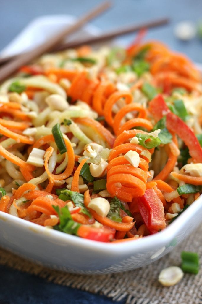 Incredibly healthy and delicious, Carrot Cucumber Asian Slaw will satisfy your taste buds and hunger alike. Perfect as a light lunch or dinner with it's fresh, crunchy veggies and the creamy nuttiness of a sesame, peanut dressing.