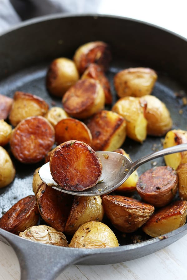 Do you know the secret to perfect Crispy Baked Rosemary Potatoes that are tender on the inside and full of the flavor? It is so much easier than it seems.