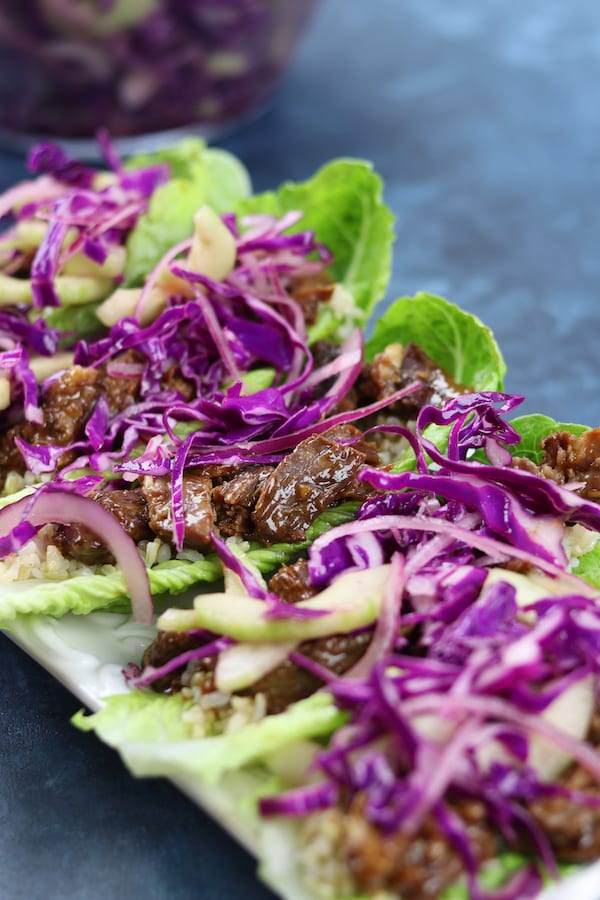 Crockpot Beef Asian Lettuce Wraps recipe is incredibly easy to make and creates wraps that are like eating a really fun and delicious salad. 