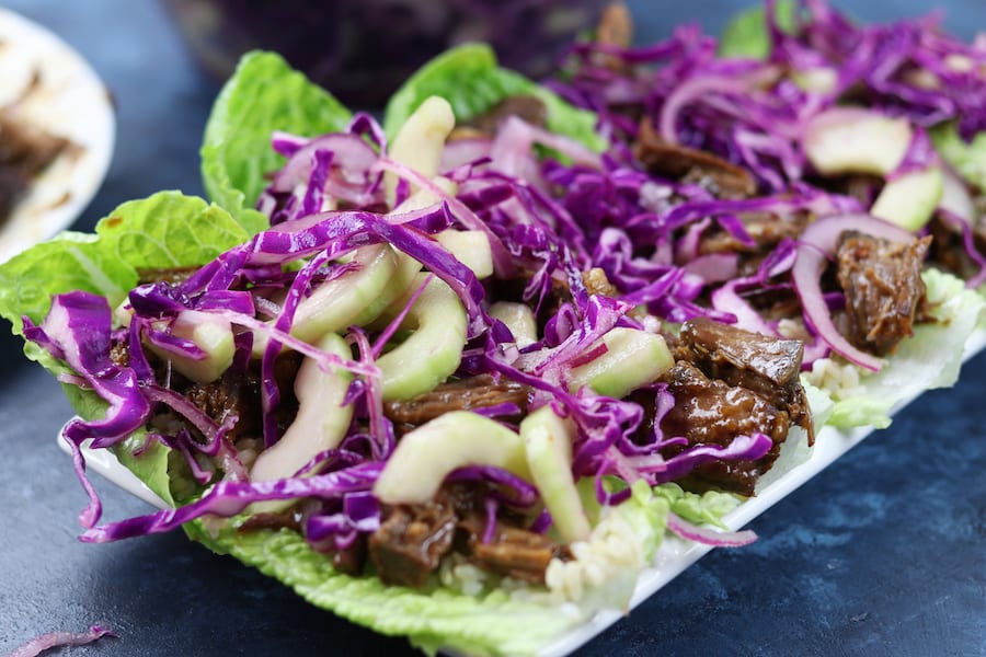 Crockpot Beef Asian Lettuce Wraps recipe is incredibly easy to make and creates wraps that are like eating a really fun and delicious salad. 