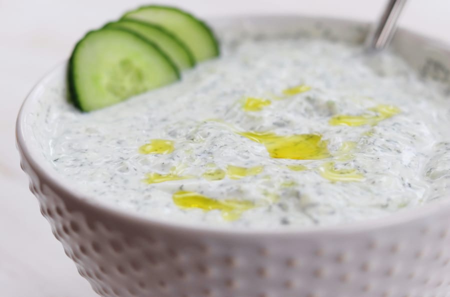 Creamy and refreshing, Tzatziki Sauce is the perfect Greek condiment with many types of meats or just simply as a dip. 