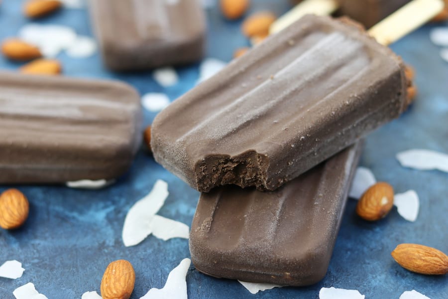 Creamy and sweetened with a kiss of honey, these Almond Joy Fudgesicles are a wonderful no-guilt popsicle that the whole family will love.