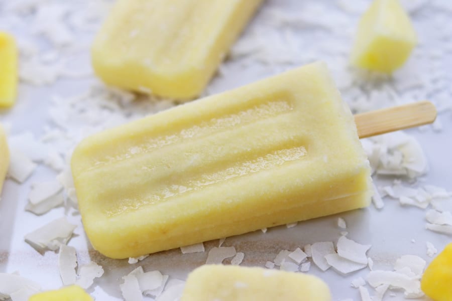 Light and refreshing, Pineapple Coconut Popsicles are a delightful homemade treat perfect for surviving the hot months of summer.