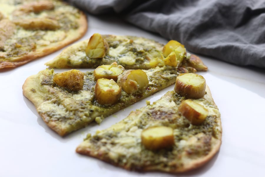 Potato Gorgonzola Pesto Naan Pizza is such a fun twist from the traditional Friday night pizza. Nutty pesto plays so well with the buttery potatoes and Italian gorgonzola. This recipe has become a major hit in our house.