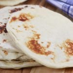 Learn the basics of making Homemade Naan, an easy & fluffy skillet bread that goes perfectly with Indian dishes or can be used to make pizza.