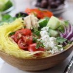 Spaghetti Squash Greek Bowls are an easy low fat and low-carb meal perfect for summer. Mix and match your favorite Greek toppings and drizzle on the popular dressing. You will love these!