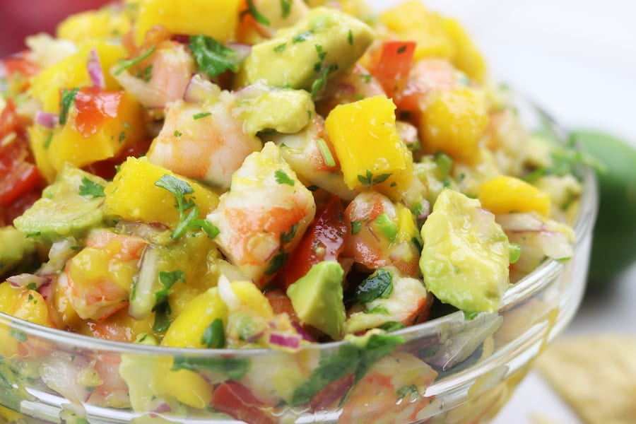 Refreshing and satisfying, Mango Shrimp Salsa is a fruity seafood feast that is perfect for parties or as a meal on hot summer nights.