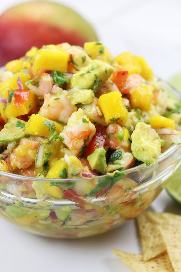Refreshing and satisfying, Mango Shrimp Salsa is a fruity seafood feast that is perfect for parties or as a meal on hot summer nights.
