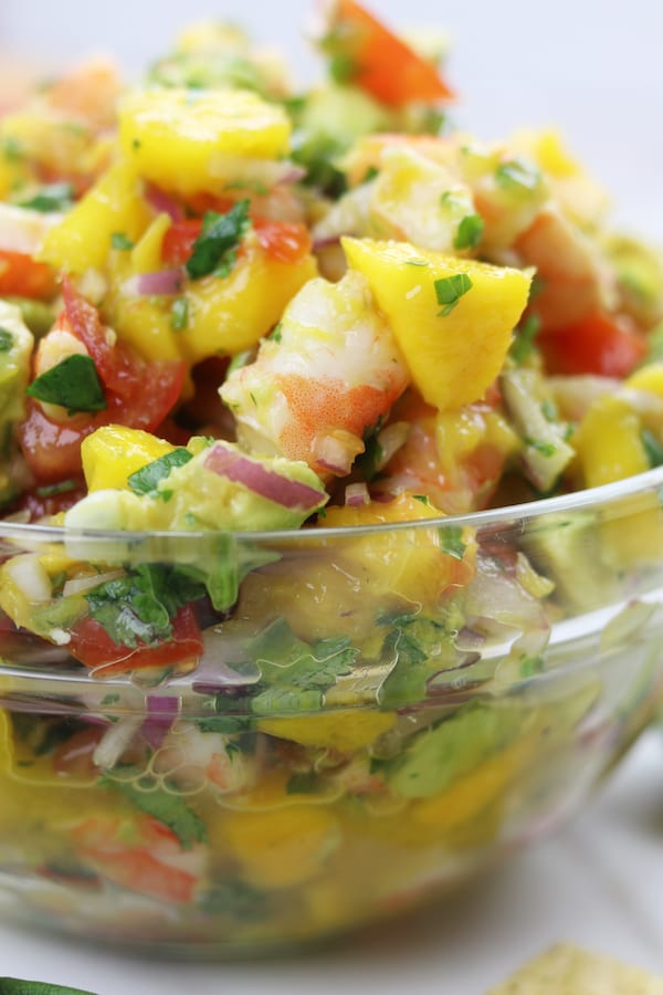 Refreshing and satisfying, Mango Shrimp Salsa is a fruity seafood feast that is perfect for parties or as a meal on hot summer nights. 