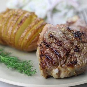 Grilled Rosemary Lamb Chops are tender cuts of meat marinated in rosemary, garlic and olive oil. Serve with your favorite side dishes for a meal scrumptious enough for company but easy enough for a weeknight.