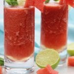 Frozen Watermelon Mojitos is the drink of summer! An adult-beverage speckled with mint, a hint of lime, watermelon simple syrup and incredibly refreshing icy watermelon. It is dangerously delicious!