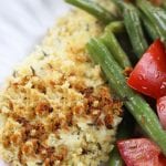 A sheet pan dinner with herby panko chicken and baked green beans that are easily dressed into a salad. Light and healthy, this is a perfect week night dinner.