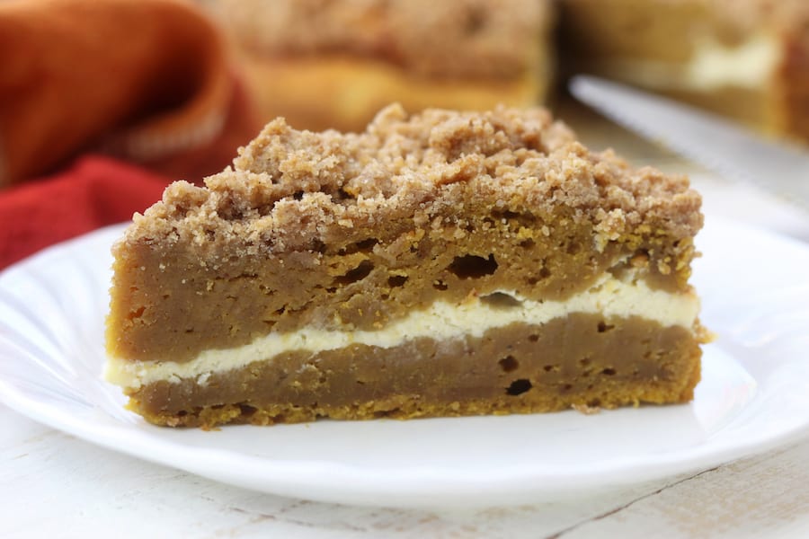 Moist and rich with the best buttery crumble topping, this Pumpkin Pie Coffee Cake recipe is a cross between two classic desserts. Add in the cream cheese layer and this becomes a favorite fall dessert!