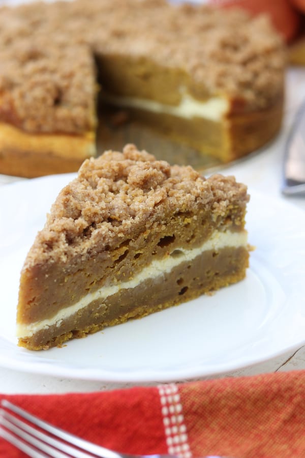 Moist and rich with the best buttery crumble topping, this Pumpkin Pie Coffee Cake recipe is a cross between two classic desserts. Add in the cream cheese layer and this becomes a favorite fall dessert!