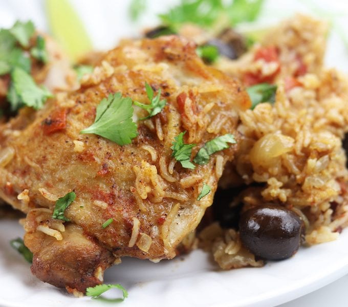 One Pot Spanish Chicken and Rice recipe is a simple, comforting meal bursting with flavor. An easy 15 minutes to prep and then pop in the oven to bake, this has become one of my favorite go to recipes that even children love.