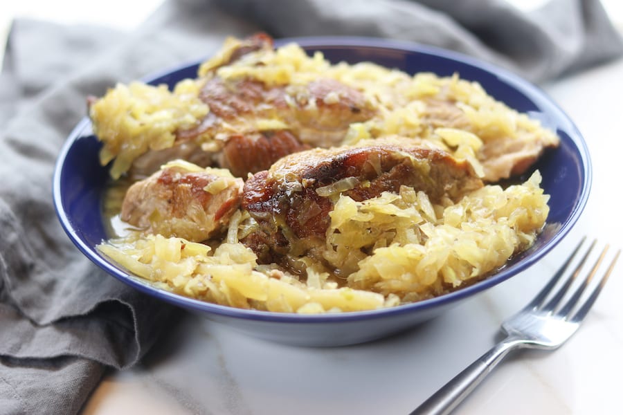 An absolute comfort meal, Country Style Pork Spare Ribs and Sauerkraut recipe creates extremely tender caramelized pork nestled into tangy sauerkraut. With just 3 ingredients and 2 steps this family favorite recipe is an extremely easy slow cooked meal.