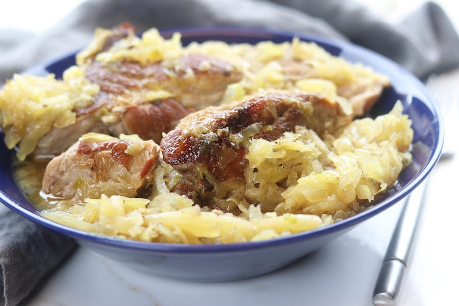 An absolute comfort meal, Country Style Pork Spare Ribs and Sauerkraut recipe creates extremely tender caramelized pork nestled into tangy sauerkraut. With just 3 ingredients and 2 steps this family favorite recipe is an extremely easy slow cooked meal. 