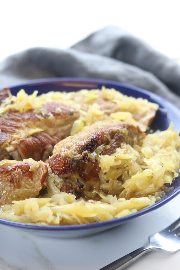 An absolute comfort meal, Country Style Pork Spare Ribs and Sauerkraut recipe creates extremely tender caramelized pork nestled into tangy sauerkraut. With just 3 ingredients and 2 steps this family favorite recipe is an extremely easy slow cooked meal.