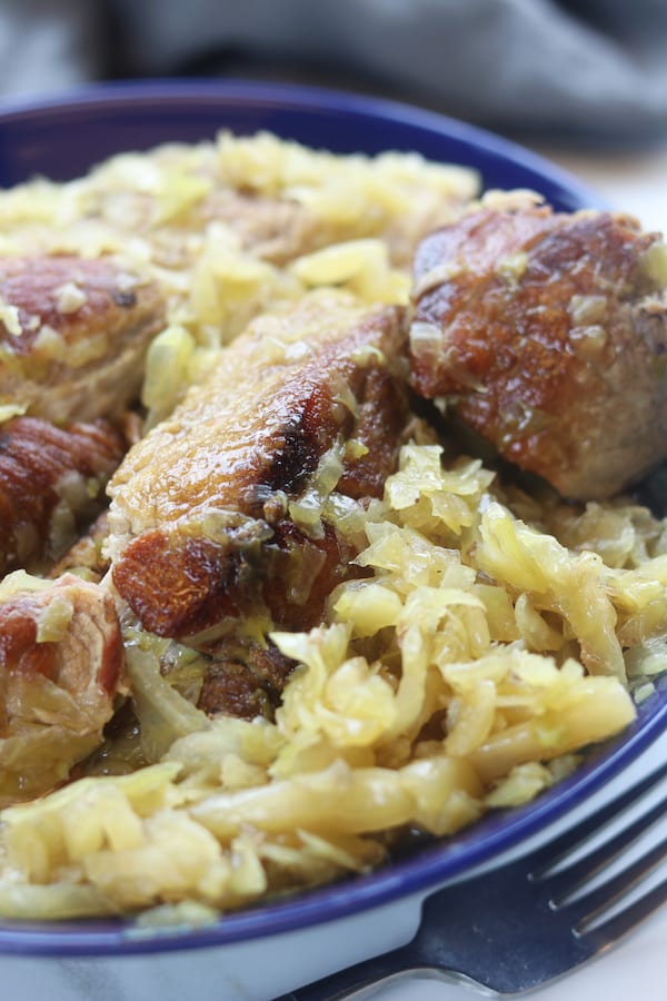 An absolute comfort meal, Country Style Pork Spare Ribs and Sauerkraut recipe creates extremely tender caramelized pork nestled into tangy sauerkraut. With just 3 ingredients and 2 steps this family favorite recipe is an extremely easy slow cooked meal.