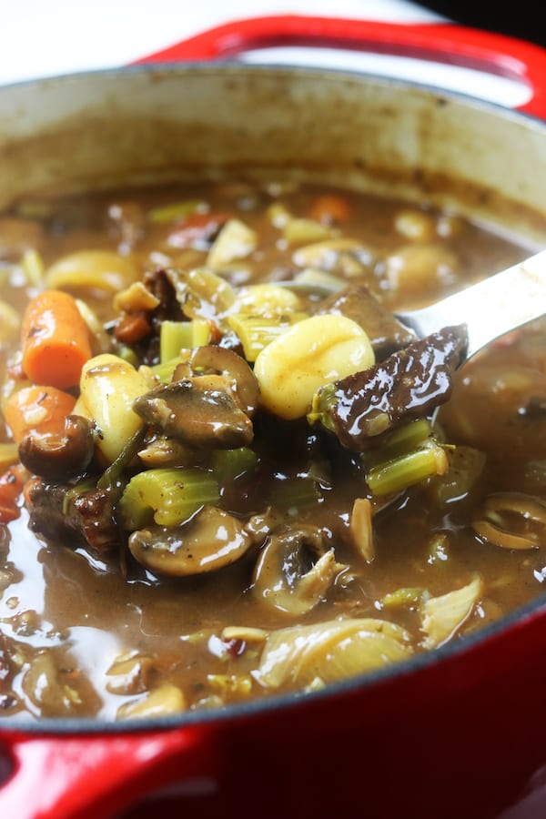 Italian Beef Stew recipe has melt in your mouth tender beef, a rich sauce with the tastes of Italy, tender gnocchi and hearty veggies. The best comfort meal on chilly days and a favorite for family meals.