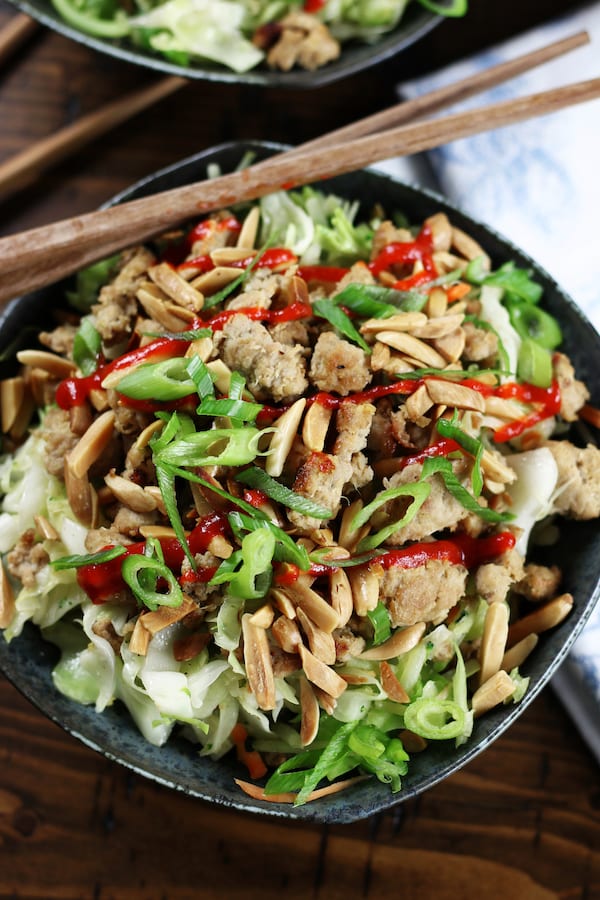 Overhead shot Chicken and Cabbage Crack Slaw with chopsticks.