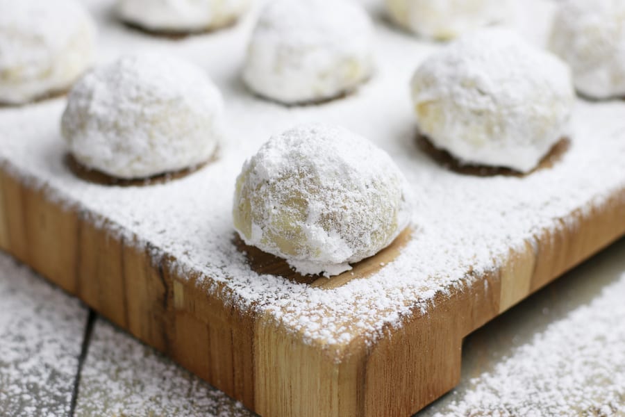 Christmas Cookies with Cranberry Orange flavor and dusted with powdered sugar.